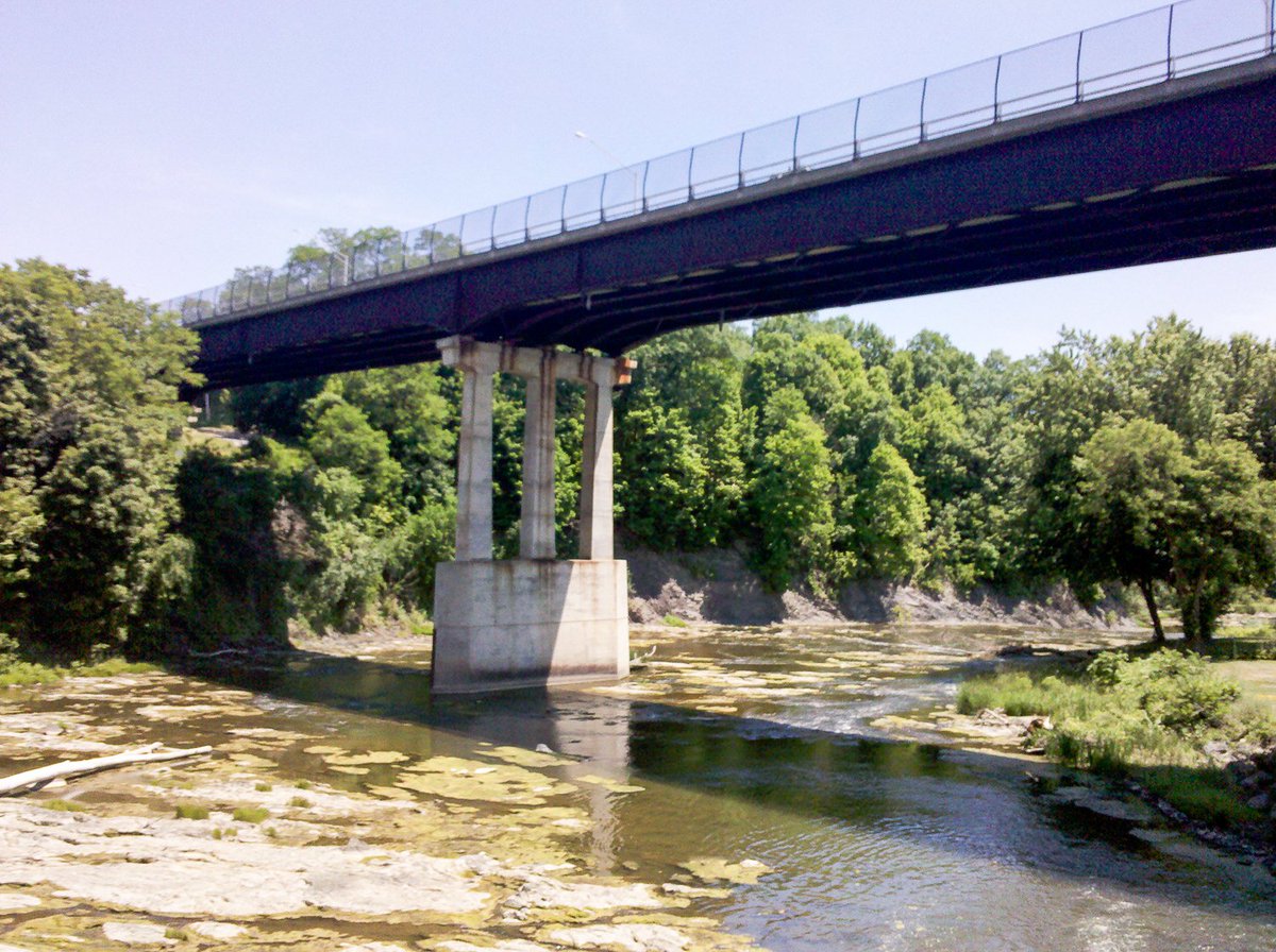 From the bridge we get an even better view of the overpass. And... what's this? Some sort of light-colored brick, buried beneath the dirt?