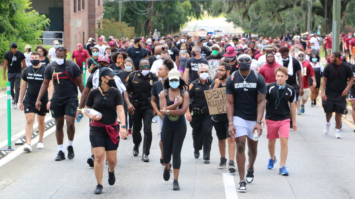 FSU_Track's tweet photo. More than 2 dozen @FSU_Track athletes and staff took part in Saturday's Unity Walk #Noles https://t.co/D4mHGRROrf