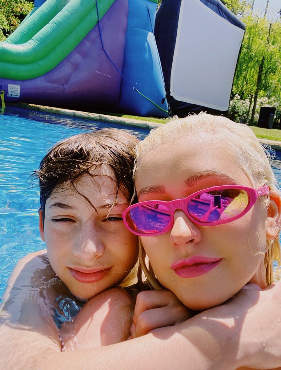 xtina's tweet photo. my graduate! so proud of you my love! And sending love and congrats to all the grads out there during this time! https://t.co/muBjJLRcLO