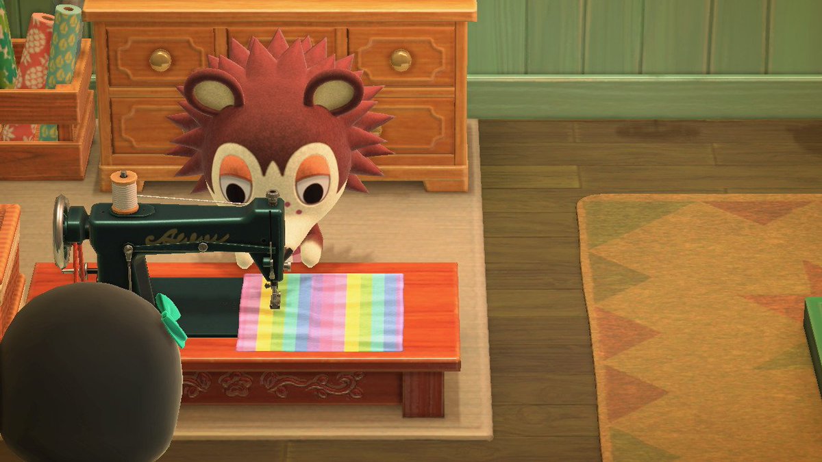 BunE_Bot's tweet photo. on the same day gay marriage was legalized in the us, i walked into my able sisters and saw sable sewing this. 2020 the first few days of pride, i walk in to see sable sewing this in my new horizons island. in conclusion sable said gay rights https://t.co/cfvHIEh0GX