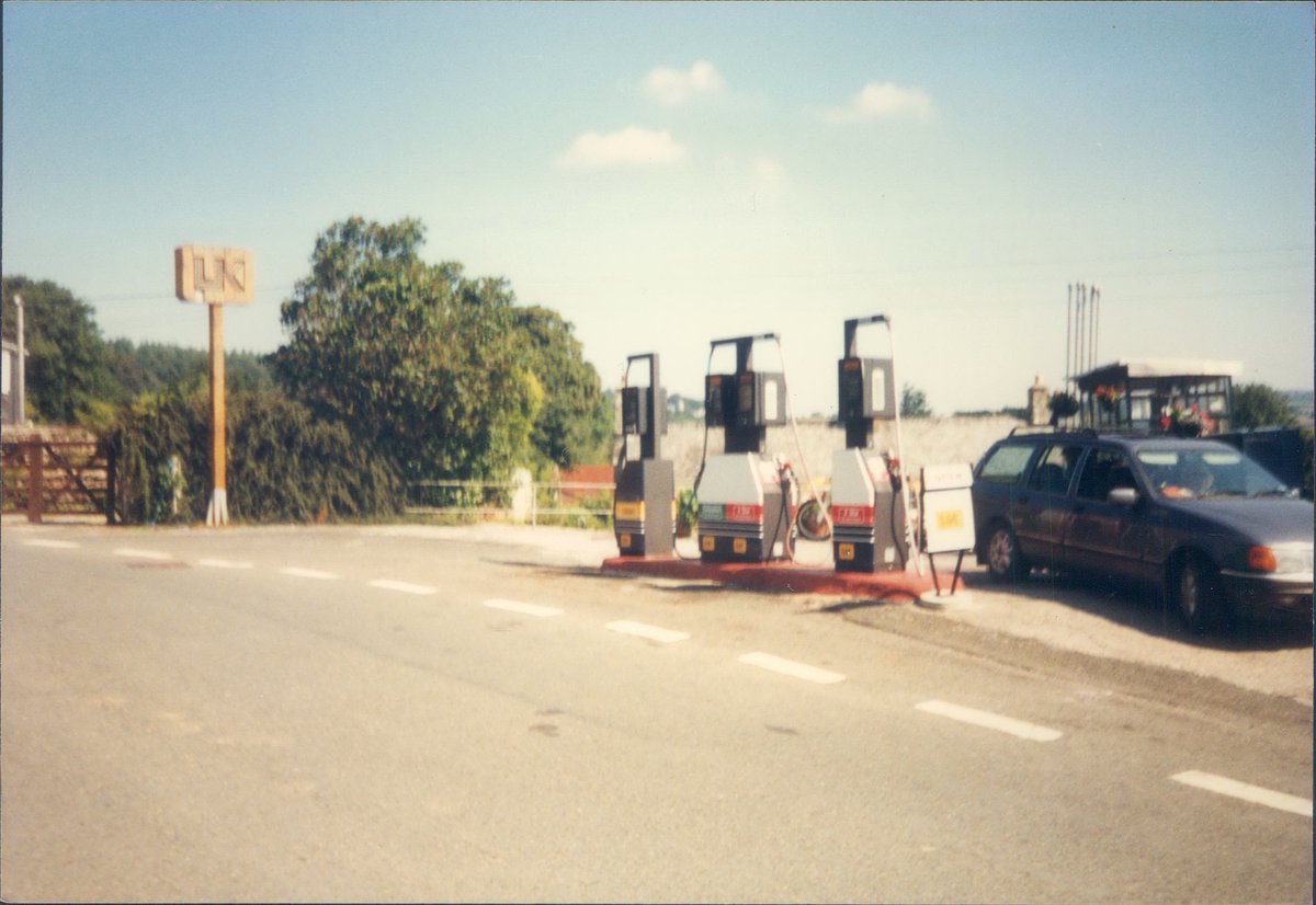 Day 174 of  #petrolstationsUK, Poundsgate, Dartmoor, Devon 1996  https://www.flickr.com/photos/danlockton/16244634706/  https://www.flickr.com/photos/danlockton/16083034798/Delightful wooden UK sign for this tiny garage in  @dartmoornpa—I think it closed by the early '00s. This was once the A384—interesting history  https://www.sabre-roads.org.uk/wiki/index.php?title=A384