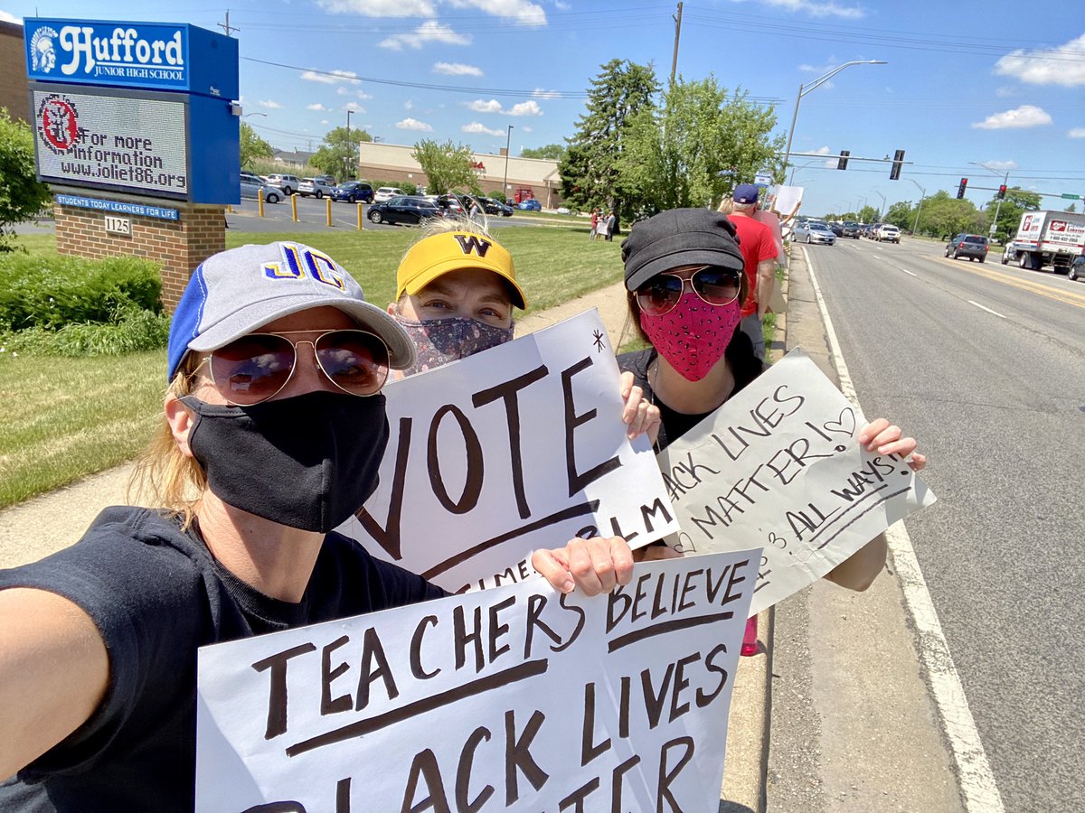 JTWestLibrary's tweet photo. We see you over here on this side of town too, wearing your hat! #TigerPride in front of @HuffordD86 w/ @MsG_JWHS - lots of West staff out today too ✊🏼✊🏽✊🏾✊🏿#teachersbelieveblacklivesmatter #BREATHE_teacherstrong #TheRealJoliet https://t.co/HzrTSH4M6N