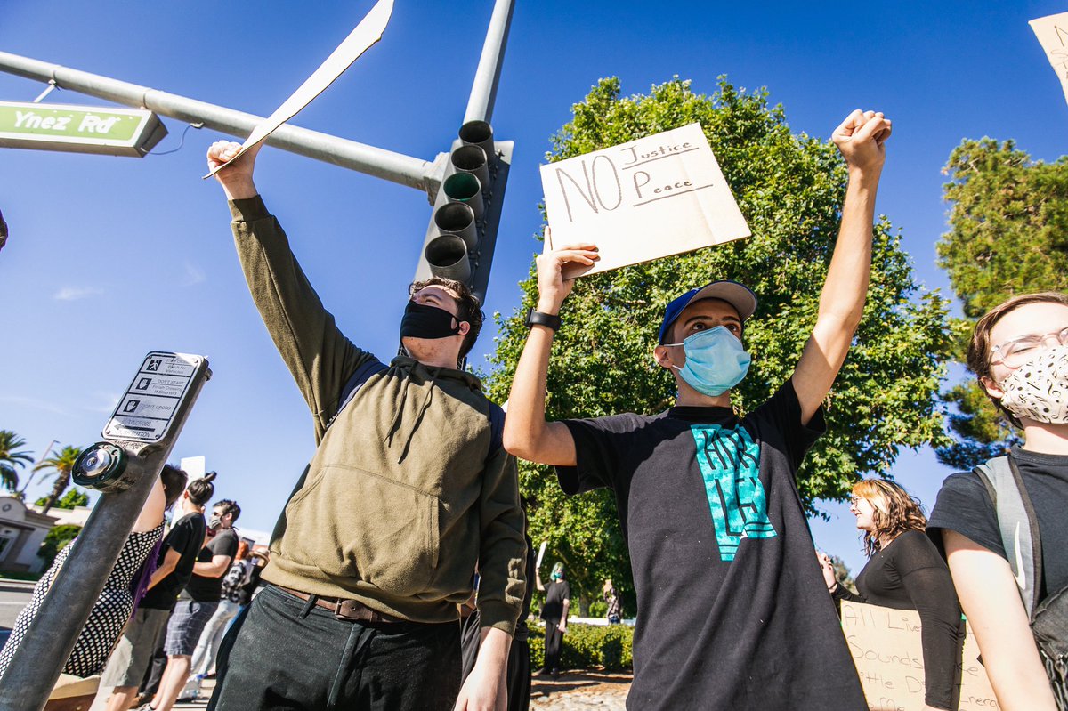 Walking into either group, one could quickly see the staunch differences between the two sets of protests. What they were saying and how they were saying brought two entirely opposite energies to the corners which they held.