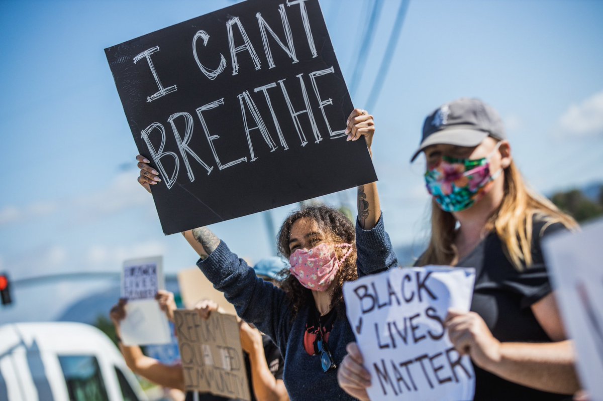 Where the Trump group projected an ideation of patriotism while dawning made-in-China Red, White, and blue flags bought at Walmart, the  #BLM group created signs of solidarity on cardboard and paper reading “ #ICantBreathe”, echoing the last words of  #GeorgeFloyd.