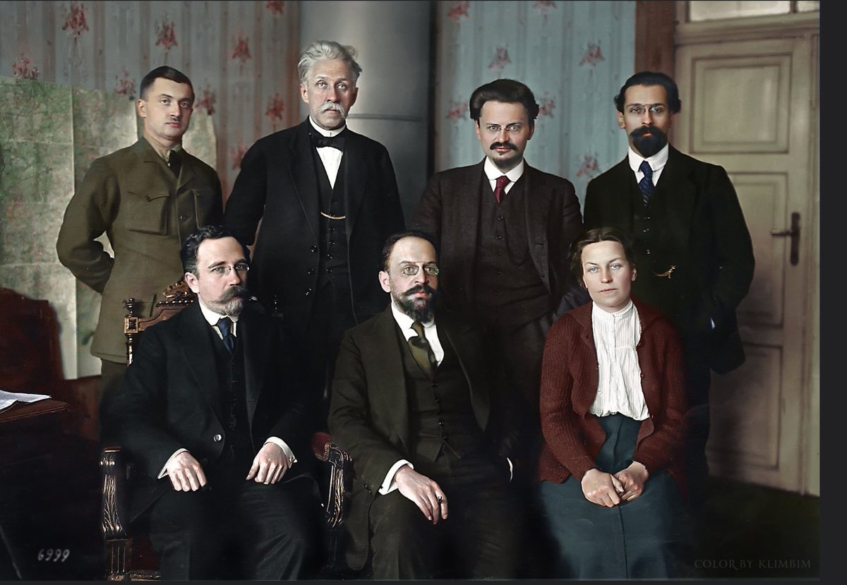 Adam Tooze on Twitter: &quot;Soviet delegation at Brest-Litovsk. Sitting, from  the left: Lev V.Kamenev, Adolff A. Joffe, Anastasia A. Bitzenko. Standing:  V. V. Lipskiy, P. Stučka, Lev D.Trotsky, Lev M.Karakhan. Color by “