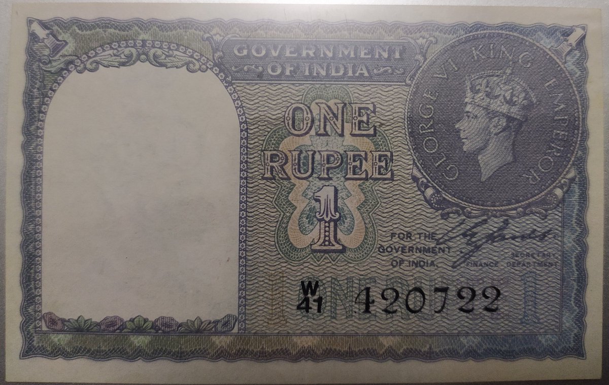 It has a stylised GRI and crown on the watermark window; ‘Government/Of India’ in the centre; ‘1’ in the top corners; ‘1/One/Rupee’ in the lower left area; Language panel in the centre; Reverse of the silver coin dated 1940. Posting two pics, with and without letter. (2/2)