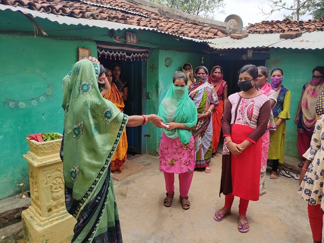 Today on the occasion of Raja Parbaon date 14-06-2020 at  csc kureswar  awared and distributed 130 sanitary napkin and 40 mask to girls and women
