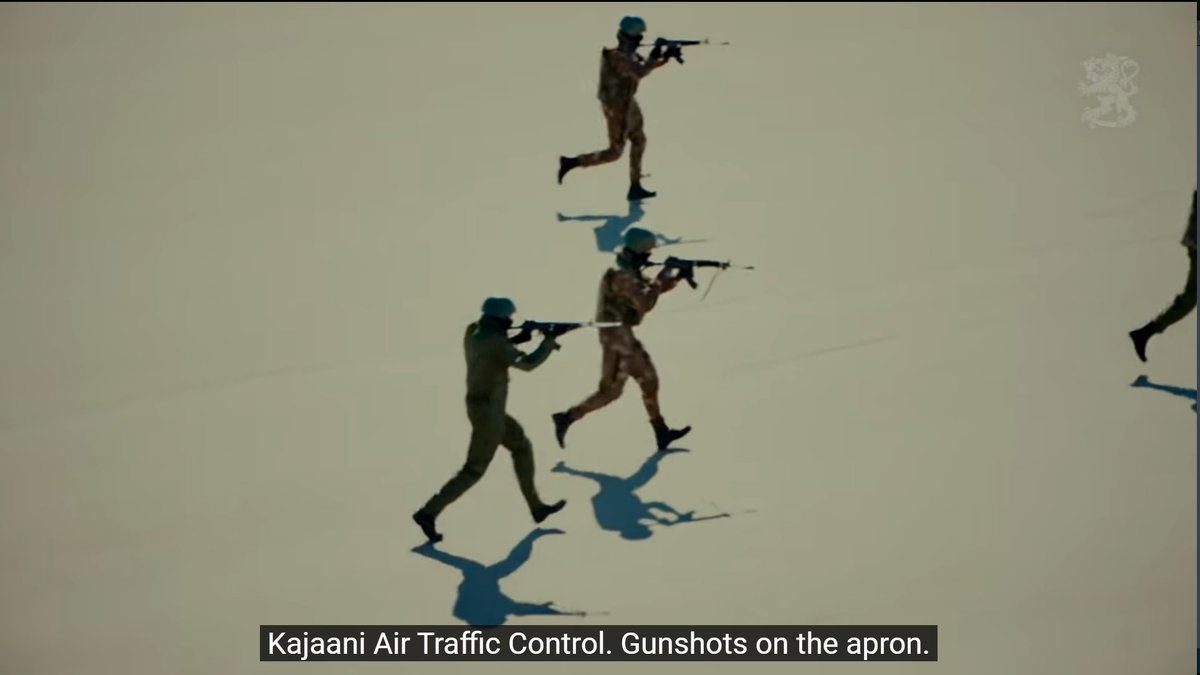 4:35 - People with guns running out of the aircraft at Kajaani airport. There are a two different interpretations of this, the first being that these portray a crack VDV or Spetsnaz team. The other is that these are part of the "Donbas tractor driver club".
