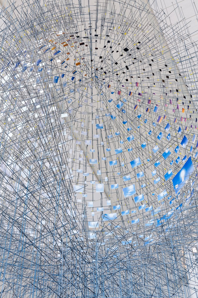 Sarah Sze' "Shorter than the Day," 1 of 4 new permanent installations <a href="/terminalBLGA/">LaGuardia Terminal B</a> evokes the passage of time through an intricate constellation of photographs as hundreds of images form a mirage-like sphere that appears to float in midair. #LGAart ow.ly/MKKJ50A6vJV