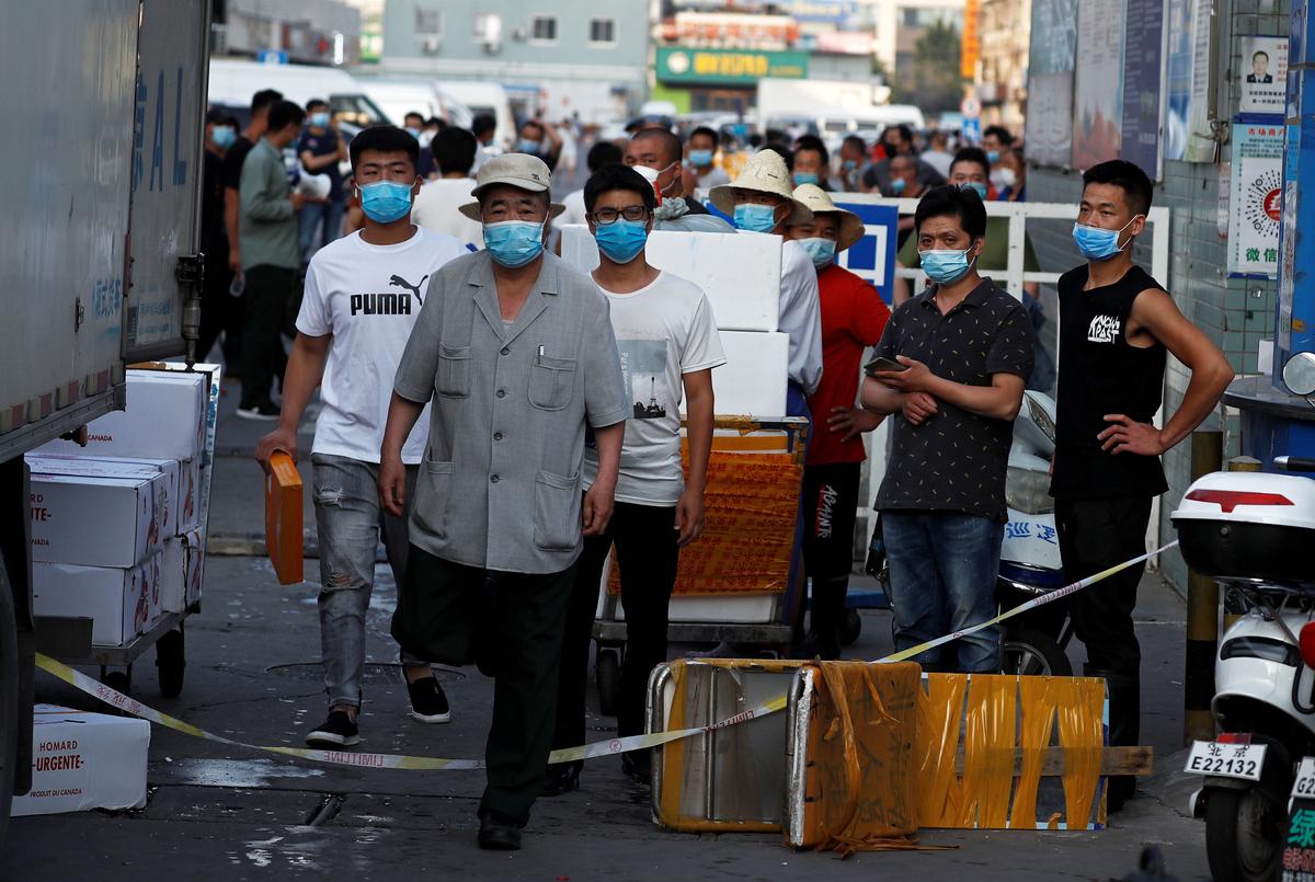Beijing district in 'wartime emergency' after virus cluster at major food market reuters.com/article/us-hea…