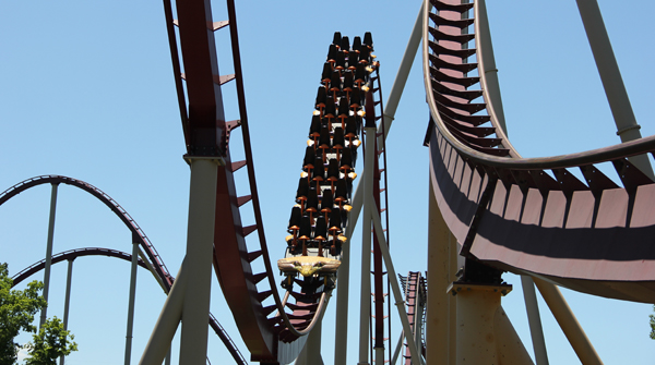 KingsIslandPR's tweet photo. SNAKE BITE: A Diamondback train slithers its way along 5,282 feet of track at speeds up to 80 mph during a test cycle in preparation for the start of the 2020 season in July. #KingsIsland https://t.co/tmQRixRg0N
