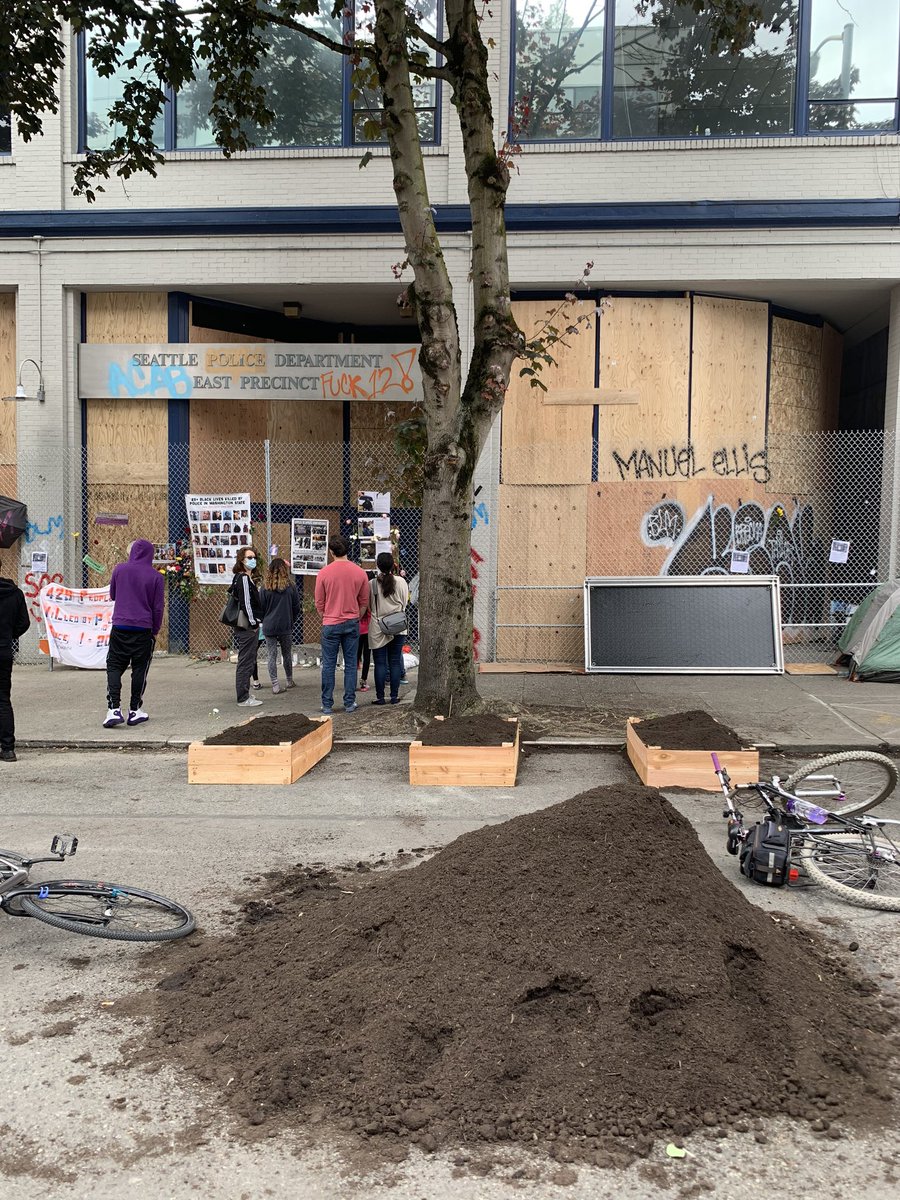 Building community gardens in front of East precinct.