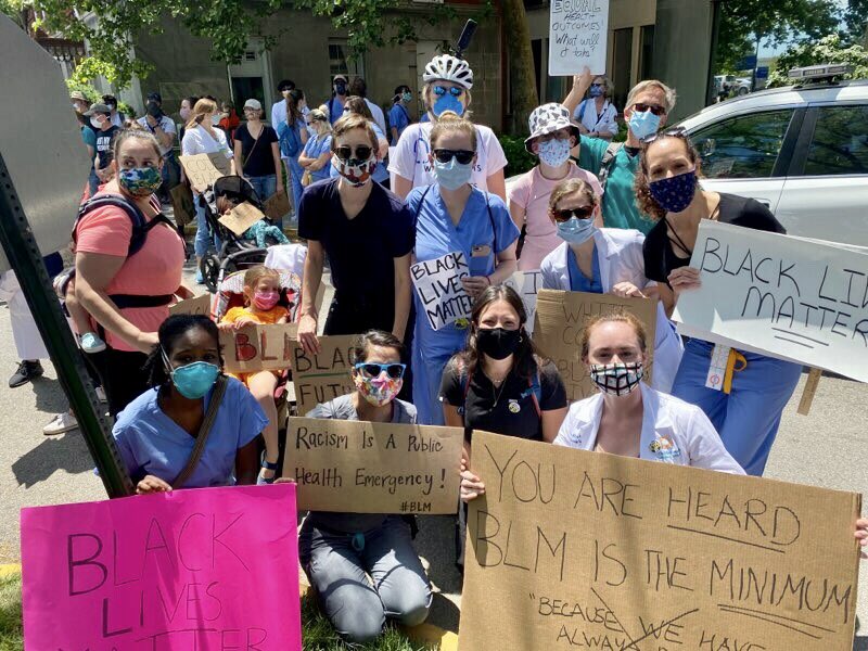 DeirdreFearon's tweet photo. White Coats for Black Lives march/rally today. Racism IS a public health crisis. So nice to see many of my friends and colleagues there. @Brown_Emergency @LLBrownMD @BrownEMRes @BrownPem @BrownMedicine @thedoctormaz #codeblackri https://t.co/sUqEzypjyn