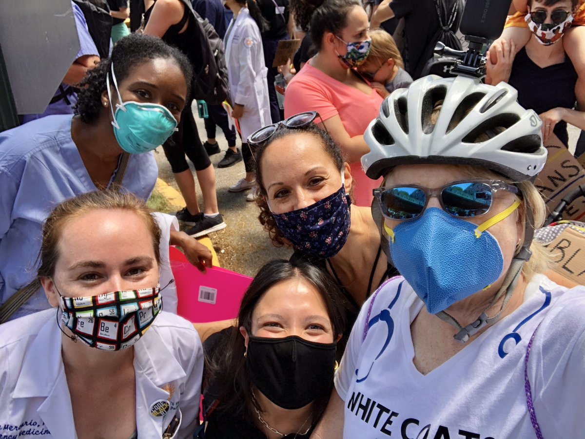 DeirdreFearon's tweet photo. White Coats for Black Lives march/rally today. Racism IS a public health crisis. So nice to see many of my friends and colleagues there. @Brown_Emergency @LLBrownMD @BrownEMRes @BrownPem @BrownMedicine @thedoctormaz #codeblackri https://t.co/sUqEzypjyn