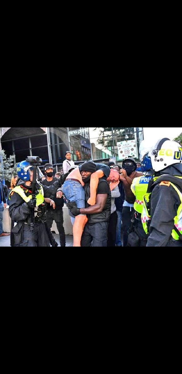 JonnyStark's tweet photo. One human caring for another, regardless of the colour of their skin. That's where hopefully we can get to. A long road ahead, but moments like this show what can be https://t.co/iqcPZ2PfF7