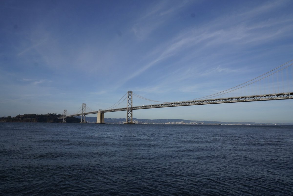 renepakmorrison's tweet photo. Two helicopters continue to circle over the Bay Bridge. Over an hour after arrests are made and traffic continues to inch along slowly with only two lanes open. I wish I had a telephoto lens on me right now #sfprotests https://t.co/XYOHWqw8En