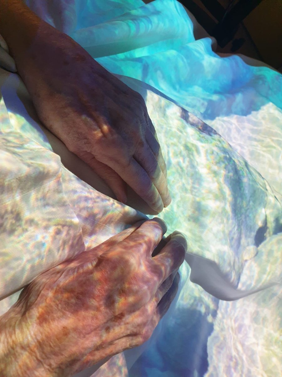 HCH_Wokingham's tweet image. The #Magictable is technology designed to support residents living with dementia. 
The colourful light projections respond to hand and arm movements, enabling residents to play with the light itself, increasing both movement and stimulation.