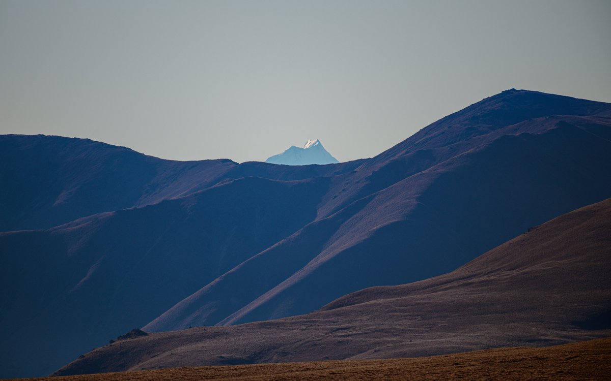 A glimpse of Aoraki (150km away) from the Buster Diggings, near Naseby, back on 31 May 2020. Great place to bring the bike and blow the cobwebs out of your lock-down legs. <a href="/NikonUSA/">NikonUSA</a> Z7 + 200-500mm f5.6.