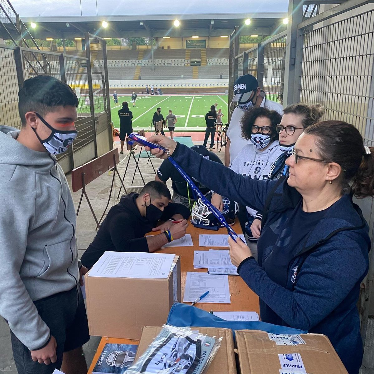 AFIReview's tweet photo. From Itay 🇮🇹 to Canada 🇨🇦 this is the new norm for football as team come back into their facilities. Players seen here , getting their temperatures checked before being admitted into practice. @Seamen_milano
#AFIReview #americanfootball #AFI #Covid19 #coronaviris #Italy https://t.co/ZOeO4MU1yH