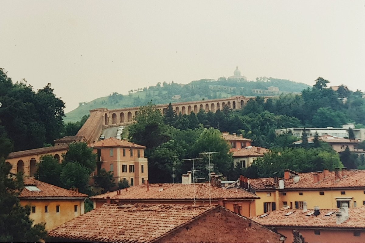 Next game was  #Yugoslavia v  #Colombia in Bologna. Higuita's goalkeeping antics kept us entertained, but also lots of flags on show inside and outside the ground, and a lovely view from the stadium.  #italia90