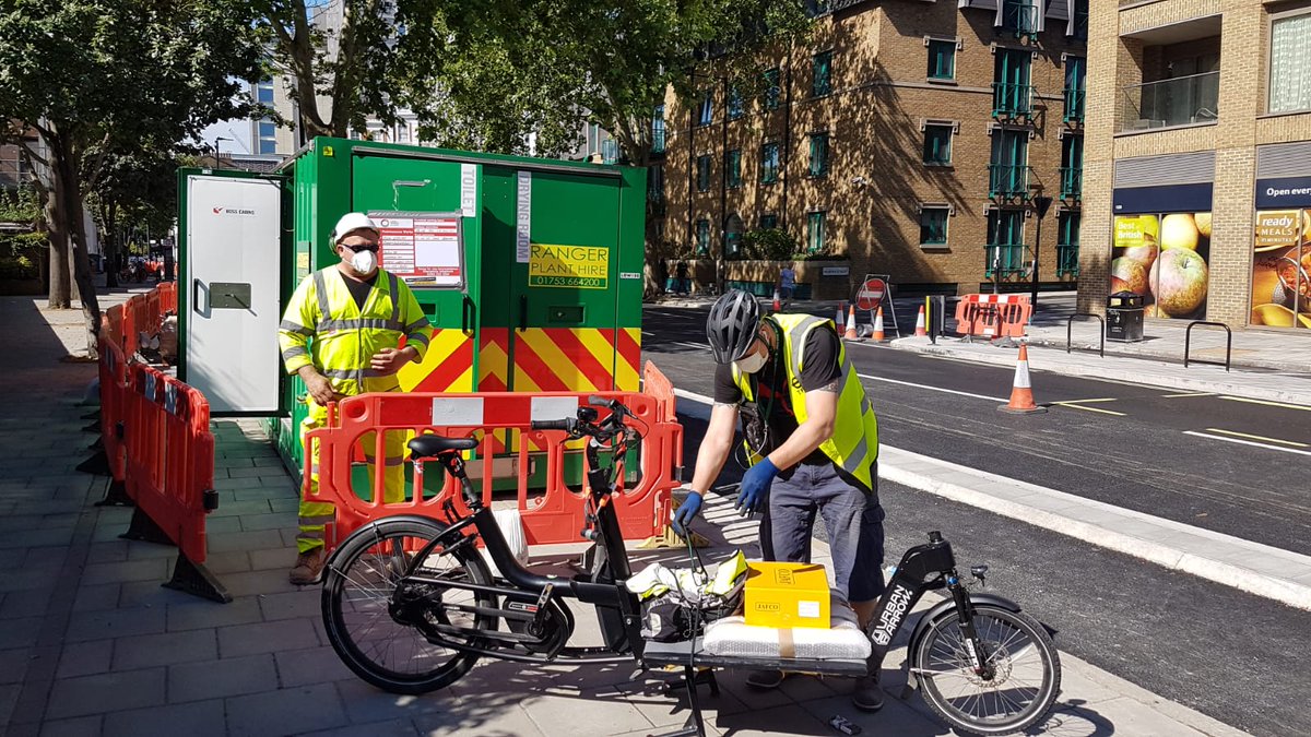Collaboration between <a href="/TfL/">TfL</a> <a href="/lambeth_council/">Lambeth Council</a> to avoid delivering a small load to site by van (to heavy to carry by hand) by using a cargobike. The Boroughs first cargobike delivery to one of their  construction sites! Social distancing in place <a href="/ukclf/">UKCLF</a> <a href="/LambethCyclists/">Lambeth Cyclists</a> <a href="/CCScheme/">Considerate Constructors Scheme</a>