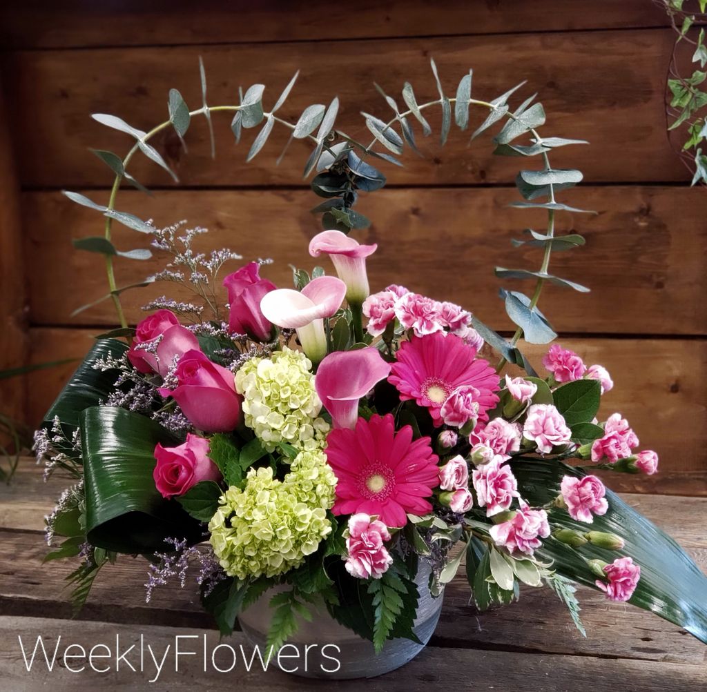 An anniversary arrangement created for a special lady.  #anniversaryflowers #weeklyflowers #ottawaflowershop #freshflowers #callas #flowerdelivery #flowerarrangement
