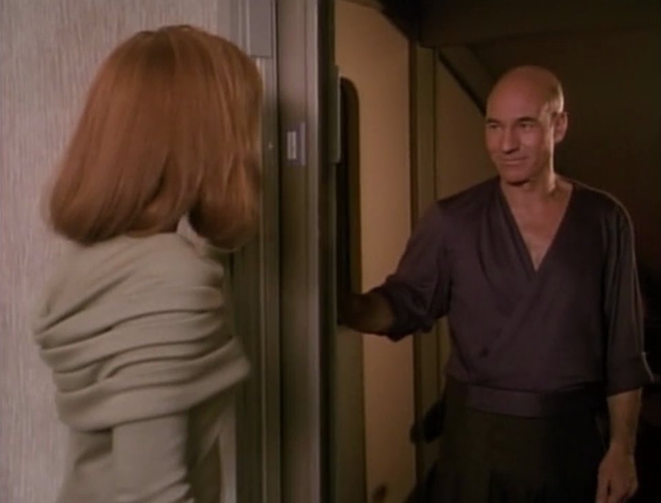 Picard doppelganger hitting on Dr Crusher -- it's all about the attitude and the outfit.