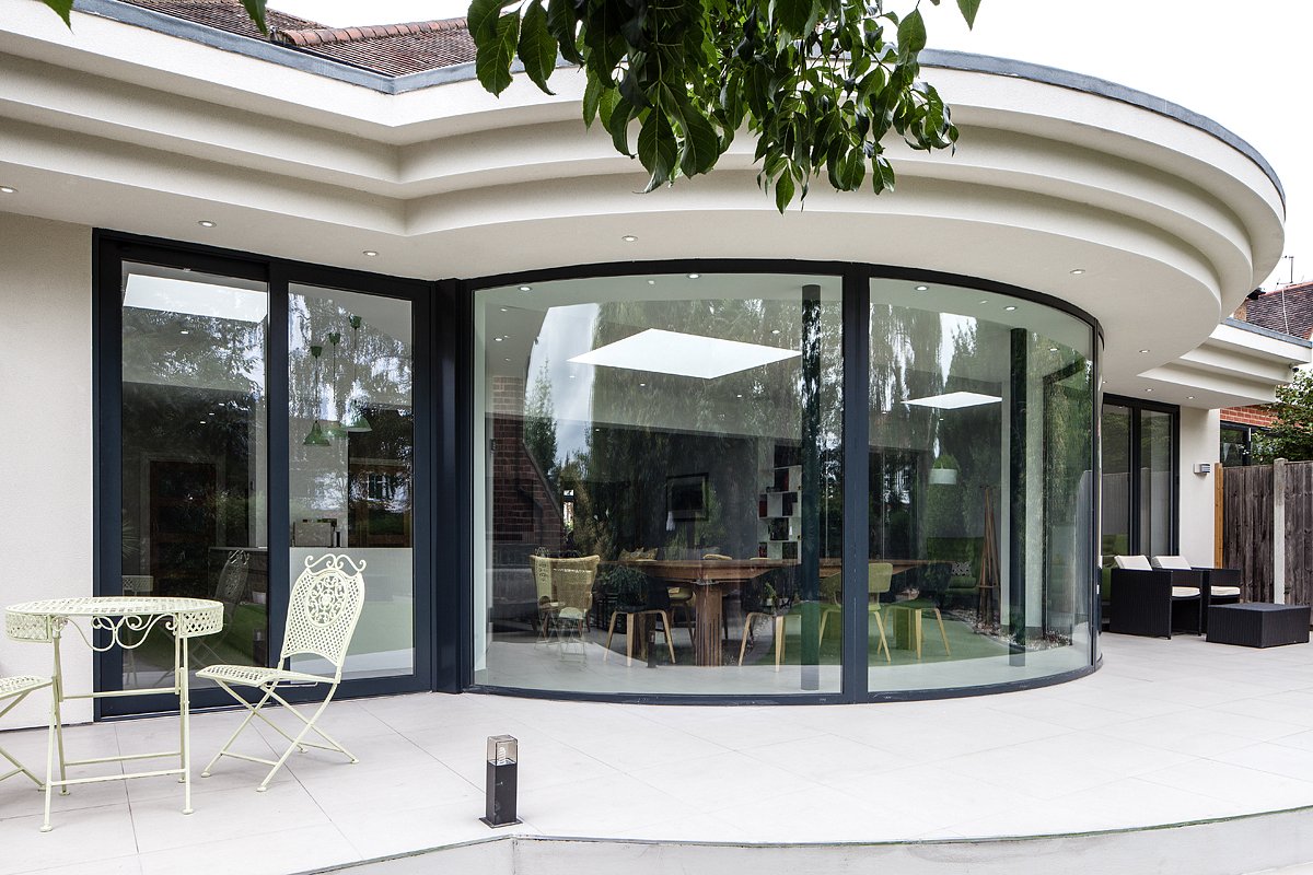 This project provides a curved glazed bay window with a dramatic curved architectural projecting soffit. #Architects #Interiordesign #Architecture #Buckhursthill #Essex #London #Extension #design #propertydevelopment #building #houzz #interiors