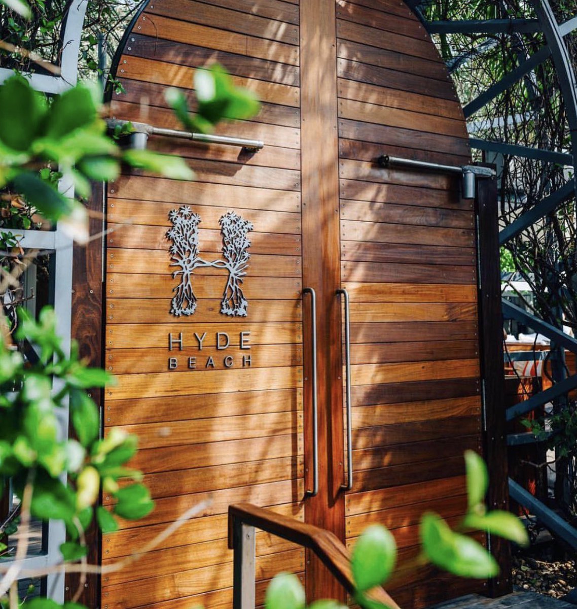 The entrance to poolside paradise.🌴 <a href="/hydebeachmiami/">Hyde Beach Miami</a> is now open! Enjoy a fun and laid back scene with all of the measures in place to keep you safe. For daybed and cabana reservations please call 305.455.2990. #worldofsbe