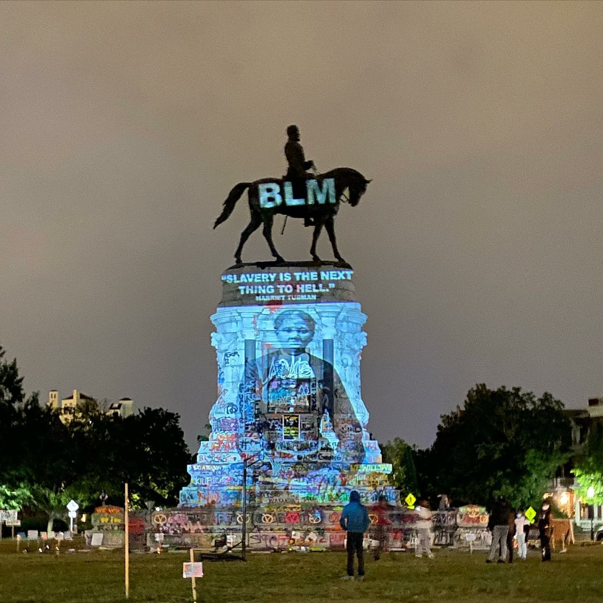 thecrisismag's tweet photo. "Slavery is the next thing to hell" 
~Harriet Tubman 

A fitting tribute projected onto the Robert E. Lee monument in Richmond,  VA.
#BlackLivesMatter #NoJusticeNoPeace https://t.co/NFEdRE9Jzb