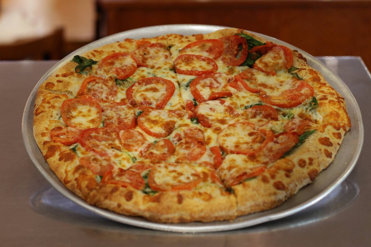 There are officially only a few days left in spring, so it's a great time to order the Spring Pizza! 🌷🌼 🍕 

Topped with garlic, olive oil, spinach, fresh tomato, and mozzarella, this pizza hits the spot. We're open for dine-in from 12-8 pm, as well as carry-out &amp; delivery!