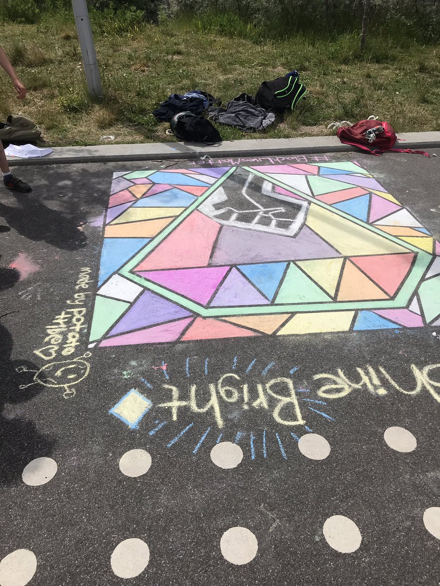 CISdkSoMe's tweet photo. Today our @CISDK middle school students used chalk to depict in colour (and amazing grid art!) quotes and issues that they think about - later the grade fives tried their hand at drawing one during lunch time #cisdk #wearecis #currentissues #speakthroughart https://t.co/Jw6LKO79VF