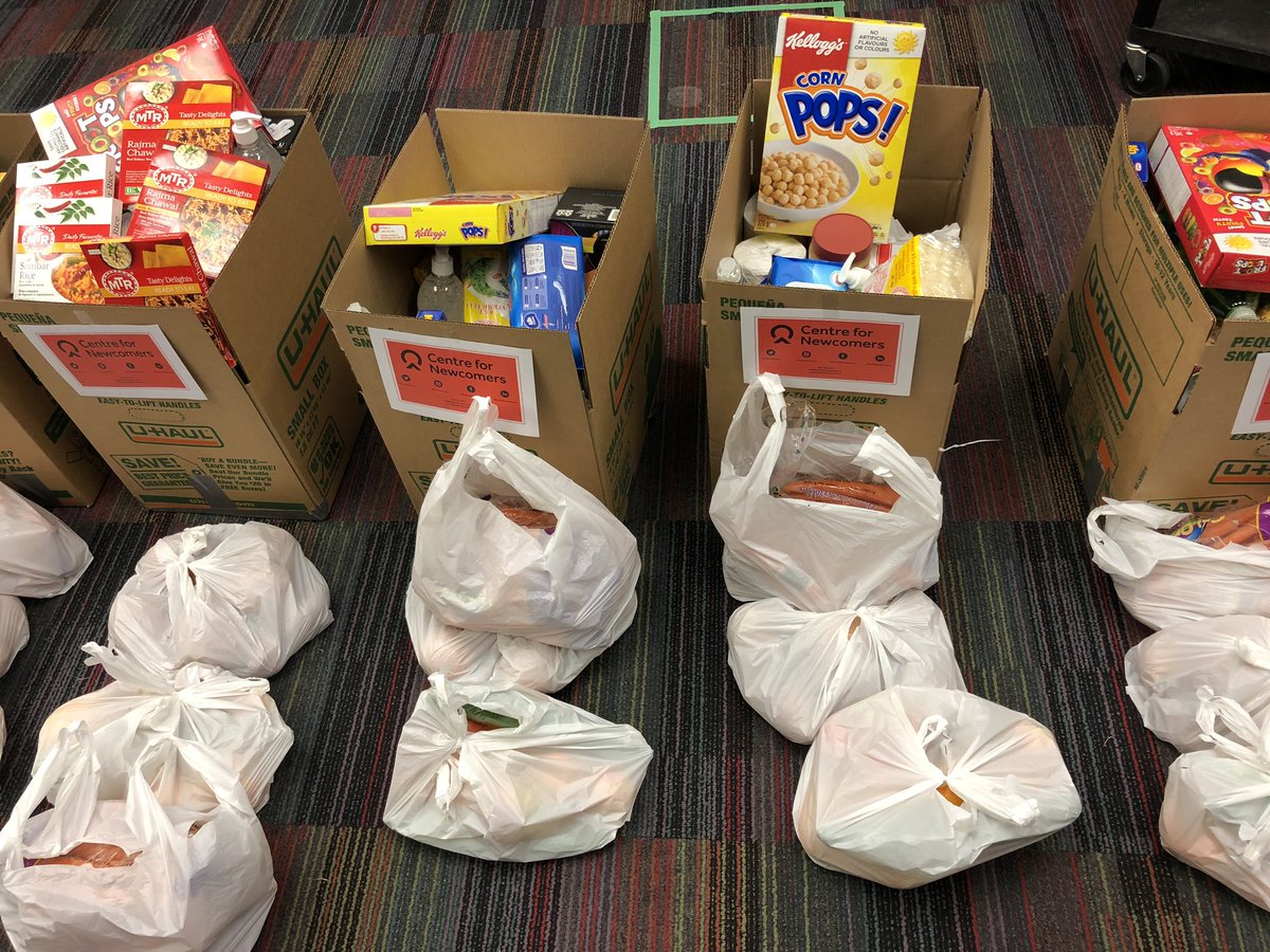 calgarystampede's tweet photo. Today, Stampede Volunteers stepped up to support @YYCNewcomers to build emergency food hampers. 

Thanks to the support of @GMCcanada, we were able to deliver them to families in need! https://t.co/n0FB9d3RK7