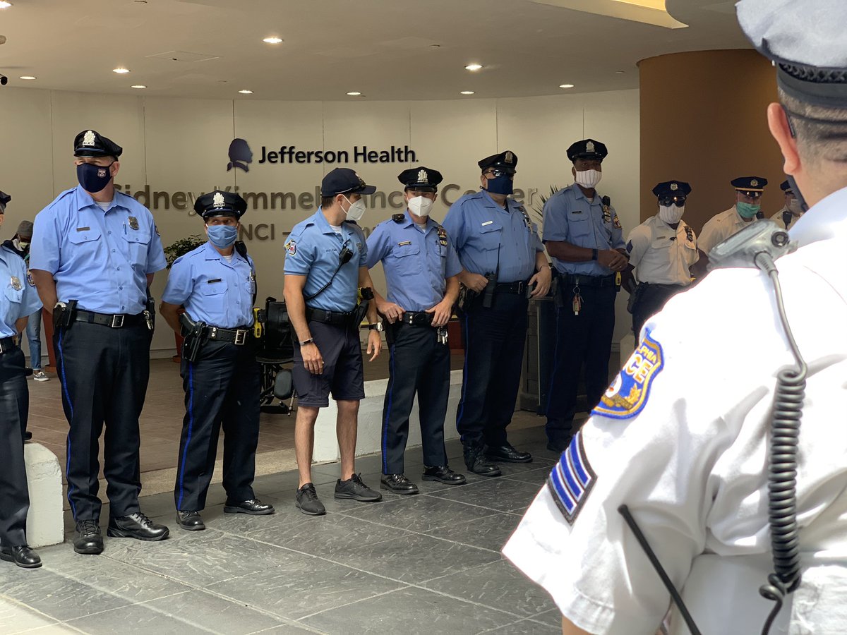 MattPetrillo's tweet photo. Two lines of @PhillyPolice wait outside of Jefferson Hospital for the release Lt. Robert Friel, who was shot in his leg while off-duty last month https://t.co/0D66LwDyoE @CBSPhilly https://t.co/4XyFVj6GDj