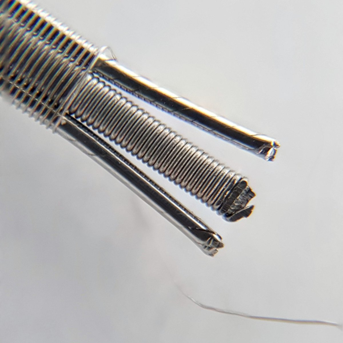 First set of #godcoils , not the best pic but love this concept🤘 3 x 30ga twisted then polished down to 26ga for the frames. #vapelife #coilbuilds