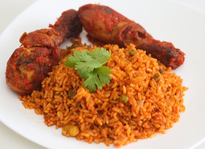Now let's talk about ghanaian dishes. Ghanaian jollof rice is made of vegetable oil, onion, bell pepper, cloves of pressed garlic, chillies, tomato paste, beef or goat meat or chicken. BTW Ghana has the best jollof rice .