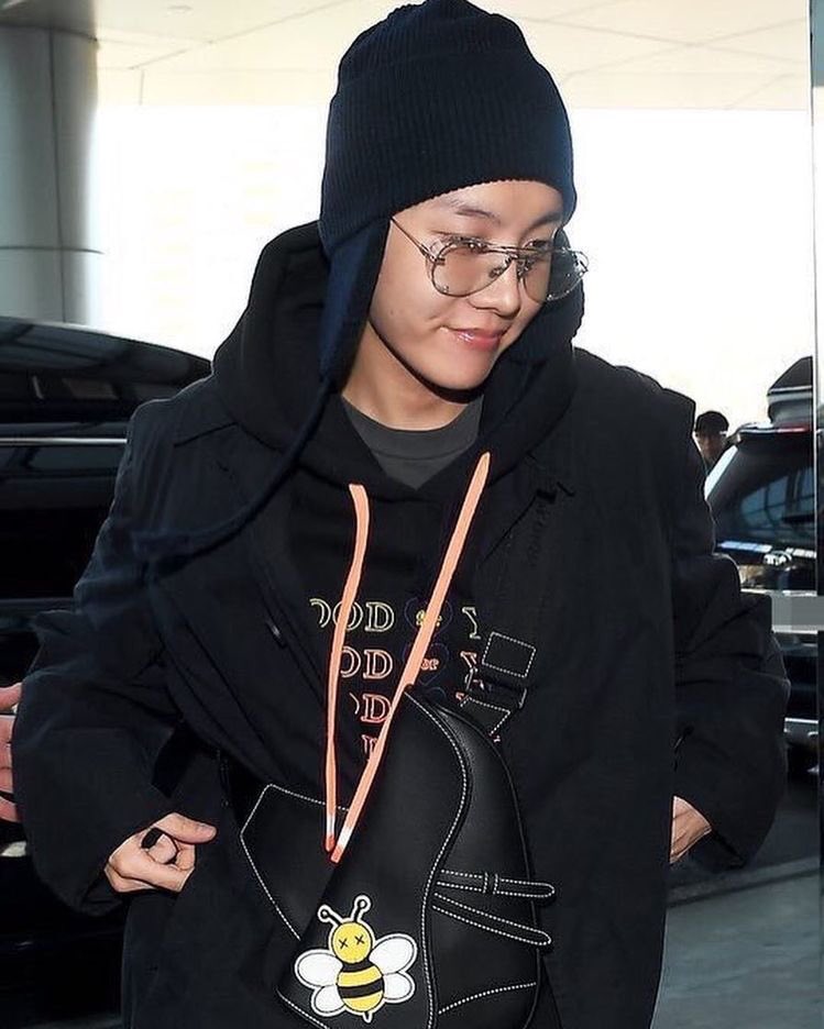 the bee attached in his bag