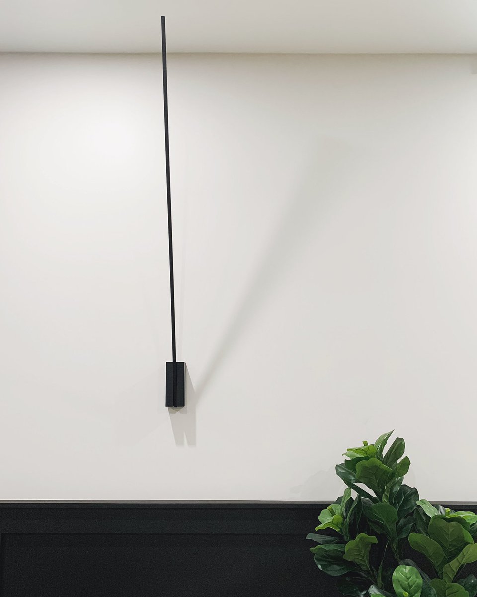 greypearldesign's tweet photo. Black wall paneling and oversized wall sconces for this 12’ high basement ceiling #styling #interiordesign #moderndesign #lighting #design #basementdesign #bdnmb #greypearlinteriordesign https://t.co/vYje46pirh