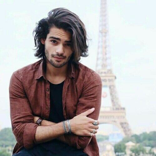 Tell me, who d'you think I resemble more? 

My mom, or my dad?