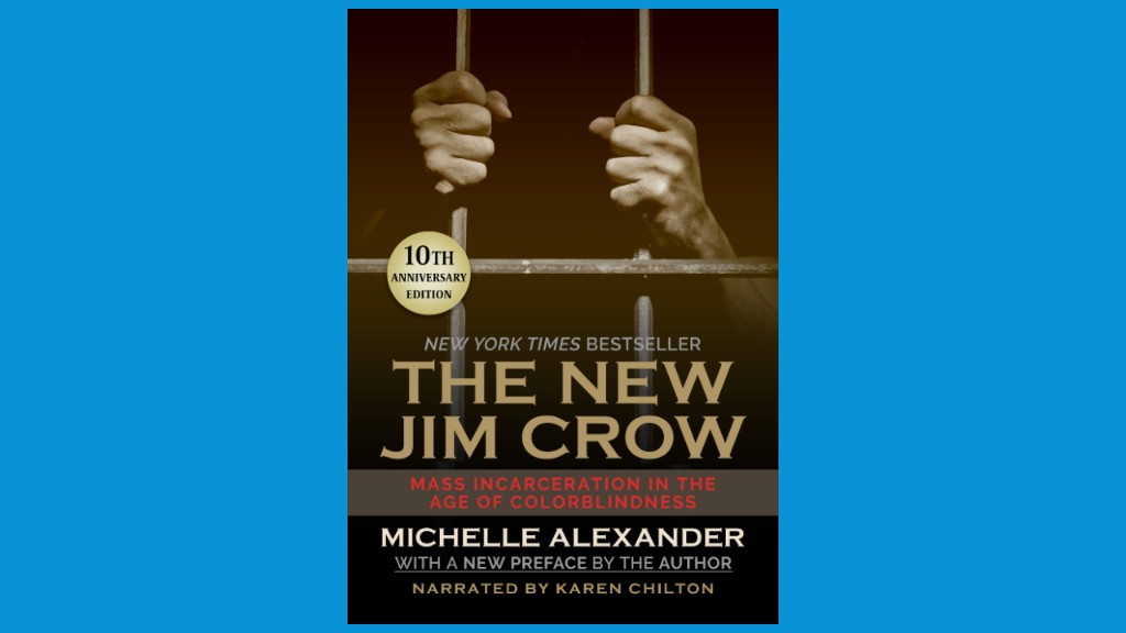 a book cover featuring a man behind jail bars, holding onto the bars