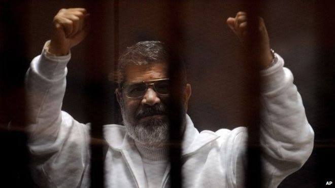 Morsi was presented before court in preeceding month; A bogus trial was initiated which was described as “charade” and mockery of Justice by Int’l human rights organisations. He was convicted of supporting Palestinian Liberation movement and Hamas, and was given death sentence.