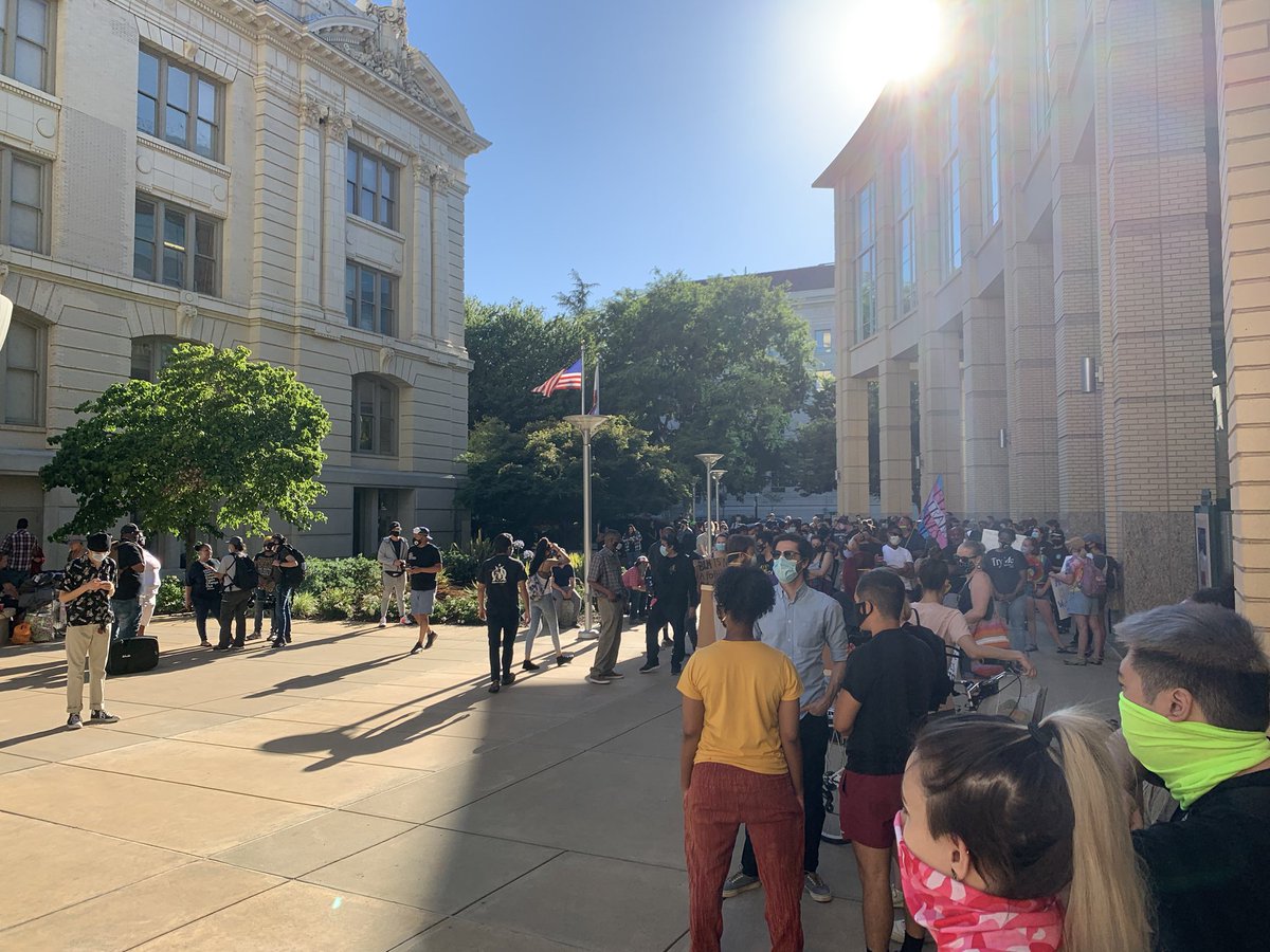 A crowd of about 150 people has formed outside of city hall. #Sacramento