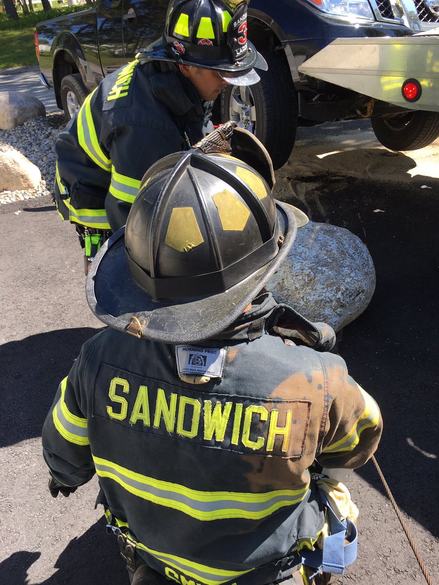 Sandwich F.F.'s responded to a MVA this morning on Cotuit Rd after a vehicle struck several large boulders becoming lodged on one. F.F.'s utilized a winch to remove a boulder for the vehicles removal.