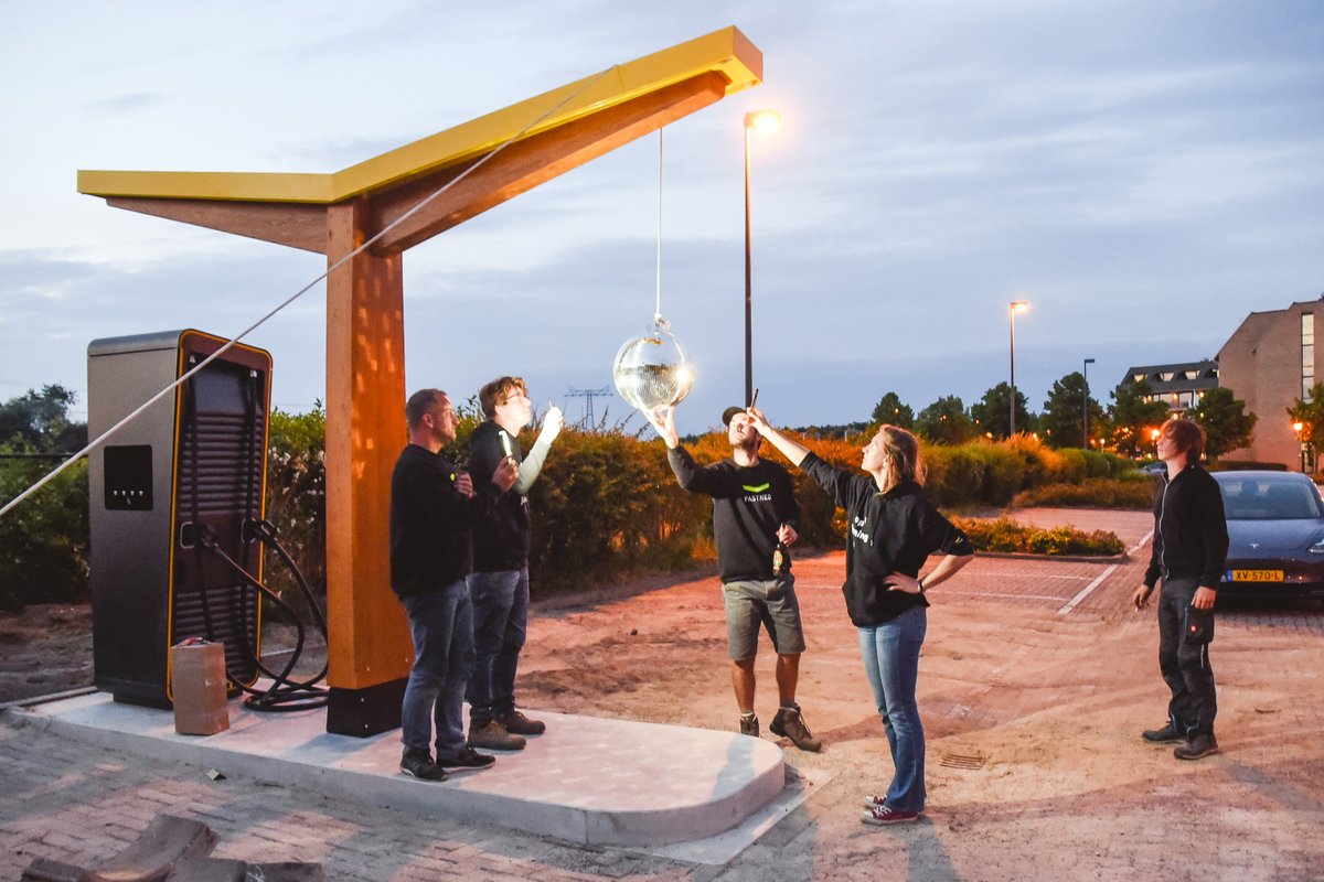 Fastned's tweet photo. Fastned tradition: spinning the disco ball &amp; celebrate when we open a new station.

A single station may be a small step. But it's tangible progress towards a fossil free future.

Never doubt that a small group of sufficiently passionate people can change the world.

📸 Rangsdorf https://t.co/WZ1BdAxXX1