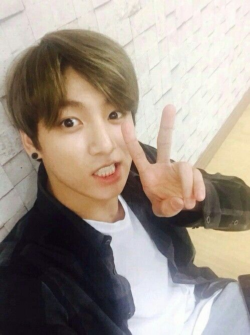 Jungkook with V( or Peace sign) a thread :