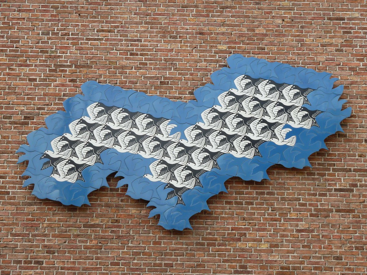 "What I give form to in daylight is only one per cent of what I have seen in darkness." ~ M. C. EscherWall tableau of one of Escher's bird tessellations at the Princessehof Ceramics Museum in Leeuwarden