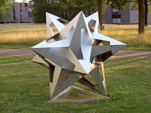 "I can't keep from fooling around with our irrefutable certainties. It is, for example, a pleasure knowingly to mix up two and three dimensionalities, flat and spatial, and to make fun of gravity." ~ M. C. EscherSculpture...as in Escher's 1952 work Gravitation (Univ. of Twente)