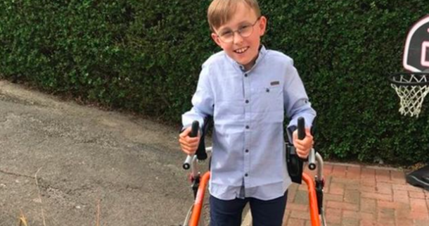 Wegotyourbackuk's tweet photo. Tobias Weller, a 9-year old boy with cerebral palsy from Sheffield has recently completed a walking marathon for charity. So far, Tobias' just giving page has raised £128,906 for Sheffield Children's Hospital and Paces School - an amazing achievement, well done Tobias! https://t.co/d2eMsHUPu7