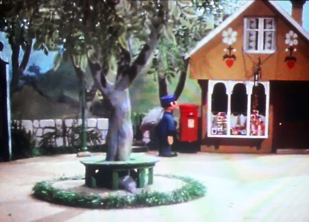 Finally, a quick look at the Green itself. We've seen the surrounding shops and houses, but not the spectacular central tree (actually a plot device in one episode, as well as the venue for the worst game of hide and seek ever), or the adjoining walls.
