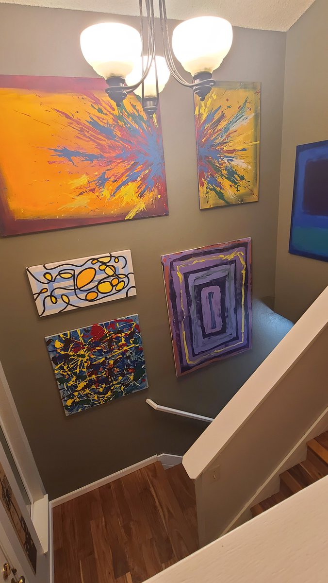 Here's an example of just some of the art as it's displayed in our stairwell. The rest is all over the house.